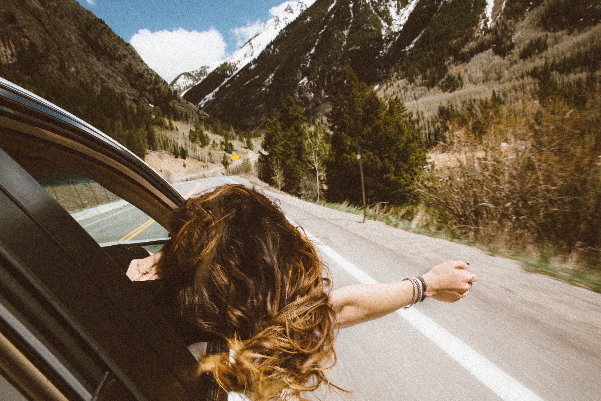 The Funnest Ways To Start Your Spiritual Journey - Image of Woman on the Open Road